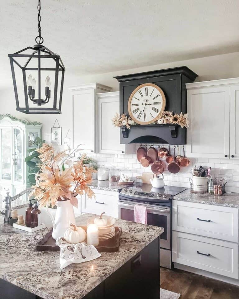 Hanging Copper Accessories Under Black Range Hood