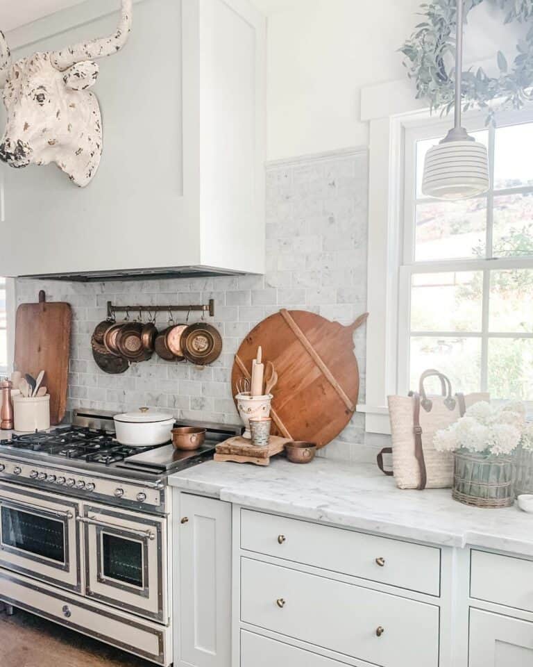 Gray Backsplash with Copper Accessories