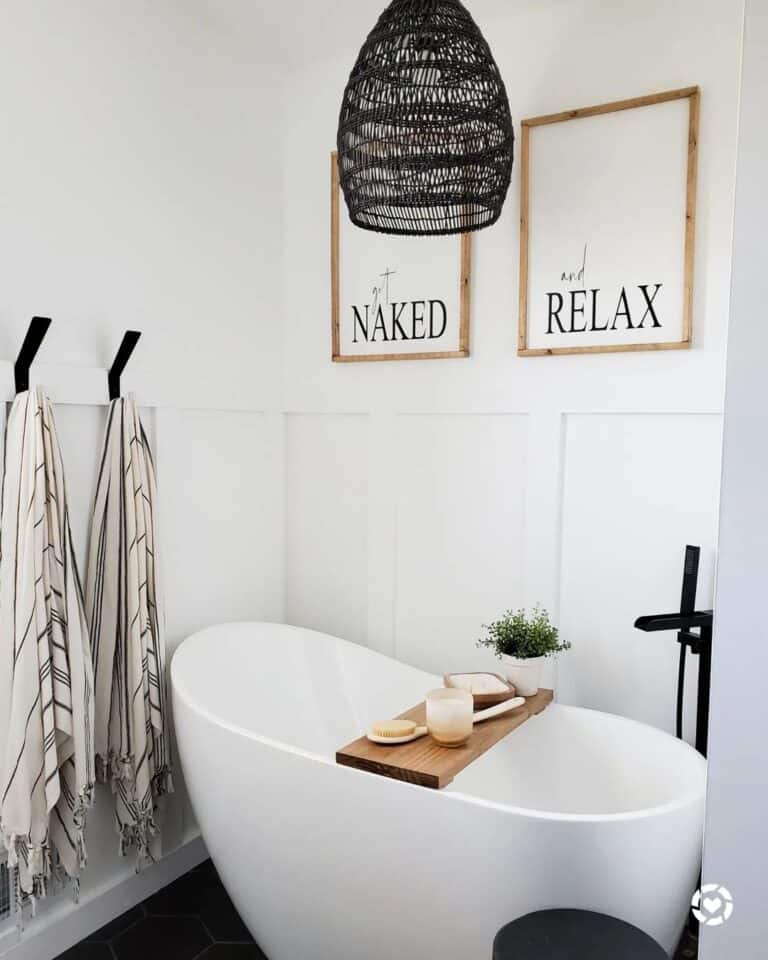 Freestanding Bathtub and Signs for Bathroom Decor