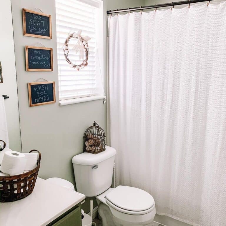 Three Farmhouse Chalkboard Bathroom Signs Beside Window