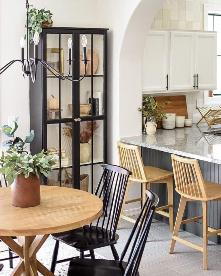 Tall Black China Cabinet in a Corner