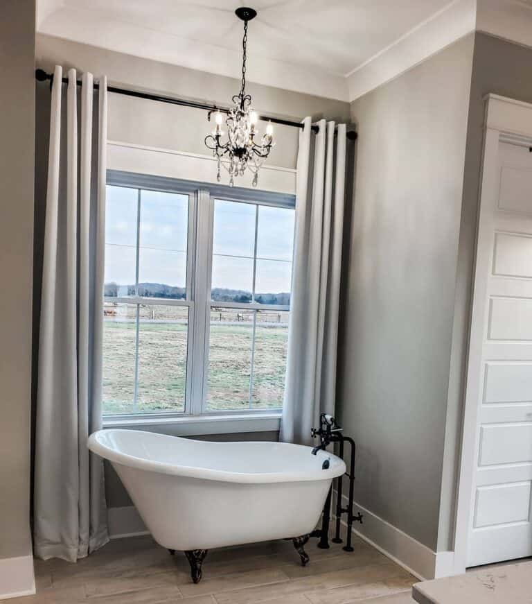 Black Tub Filler with White Soaking Bathtub