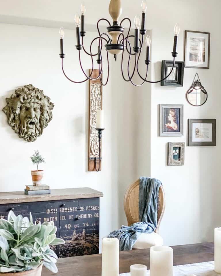 Black and White Chandelier Over White Candles