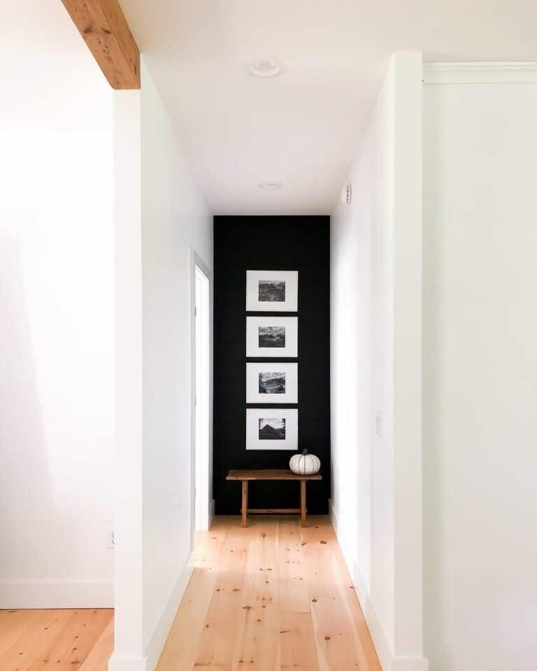 Black Accent Wall with Art Gallery