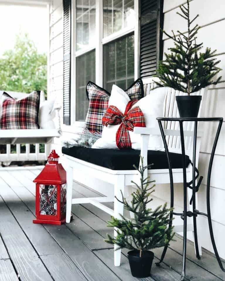 Plaid Pillows on White Porch Furniture