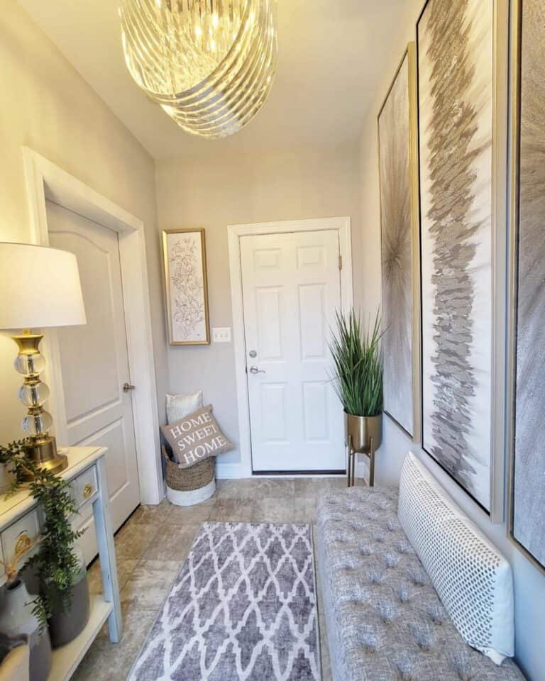 Tufted Bench Below Modern Entryway Wall Décor