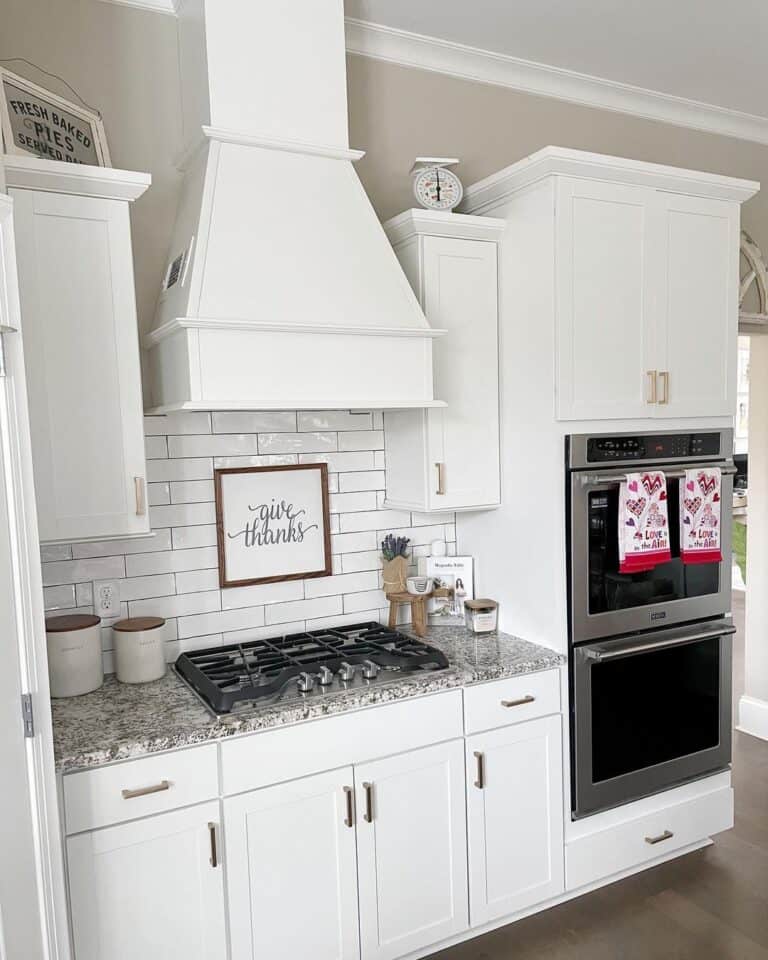 Kitchen Signs Around a White Vent Hood