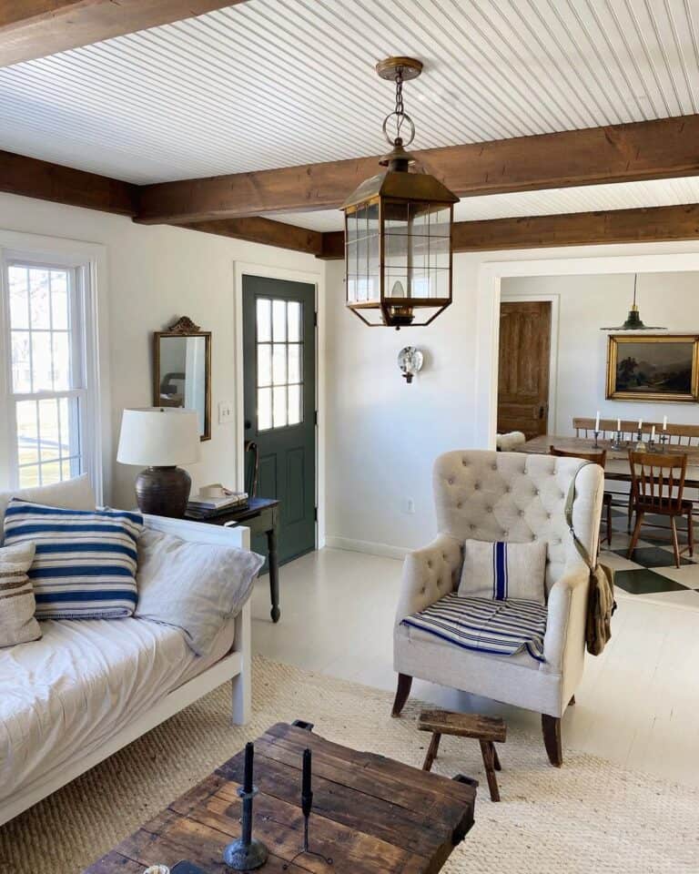 Brass Lantern Light Fixture Over a Rustic Coffee Table