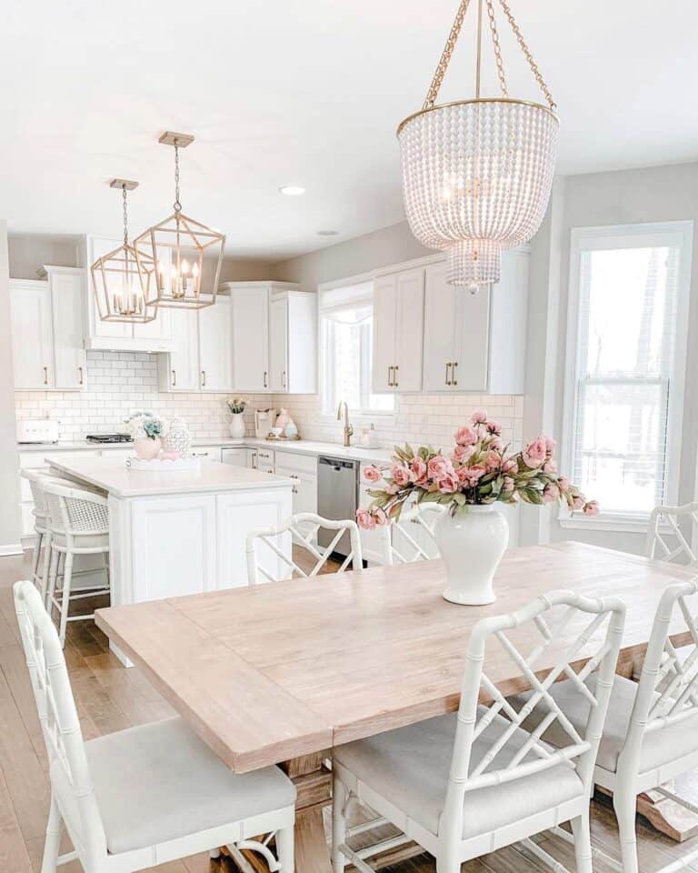 Gold Kitchen Lantern Lights Over a White Kitchen Island