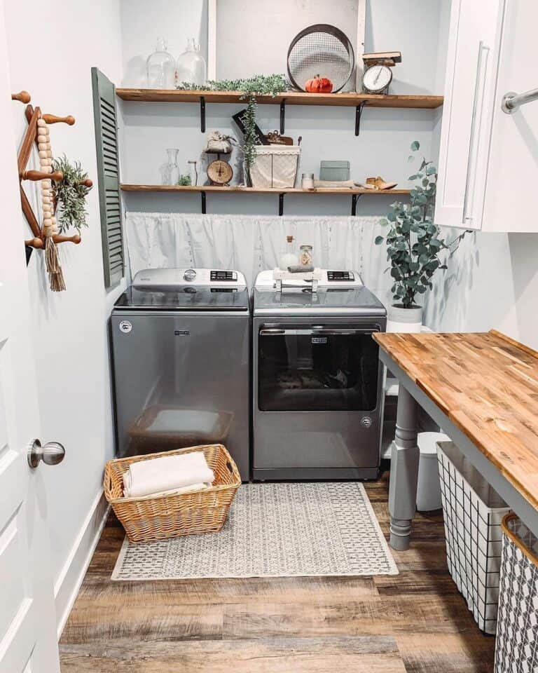 A Green Shutter on a Light Grey Laundry Room Wall