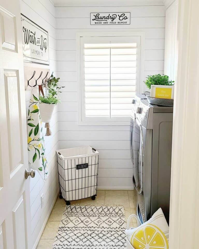 White Laundry Room Signs and Bright Green Plants