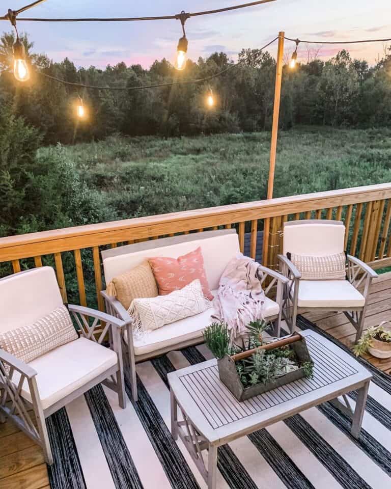 Outdoor Farmhouse Light Fixtures Over a Wood Deck