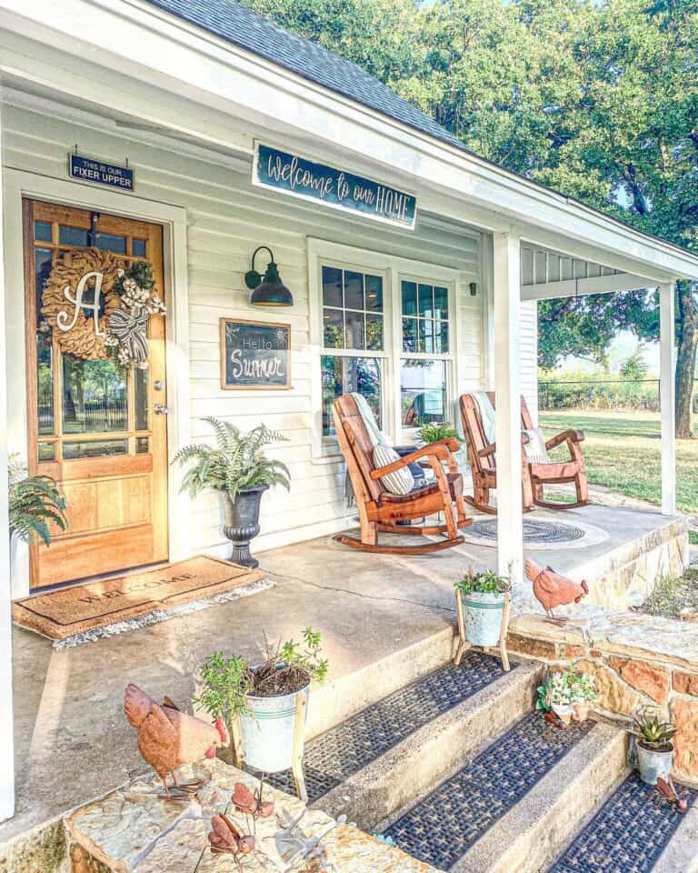 Farmhouse Outdoor Lighting and Green Ferns