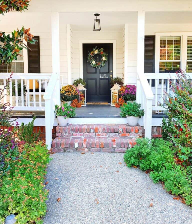 White Farmhouse with Brick Steps