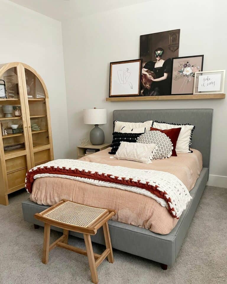 Floating Shelf Above a Grey Bed