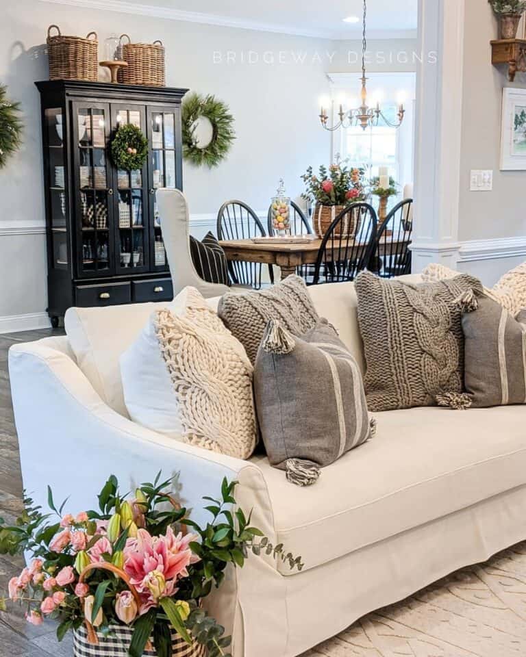 White Sofa with Cable Knit Cushions