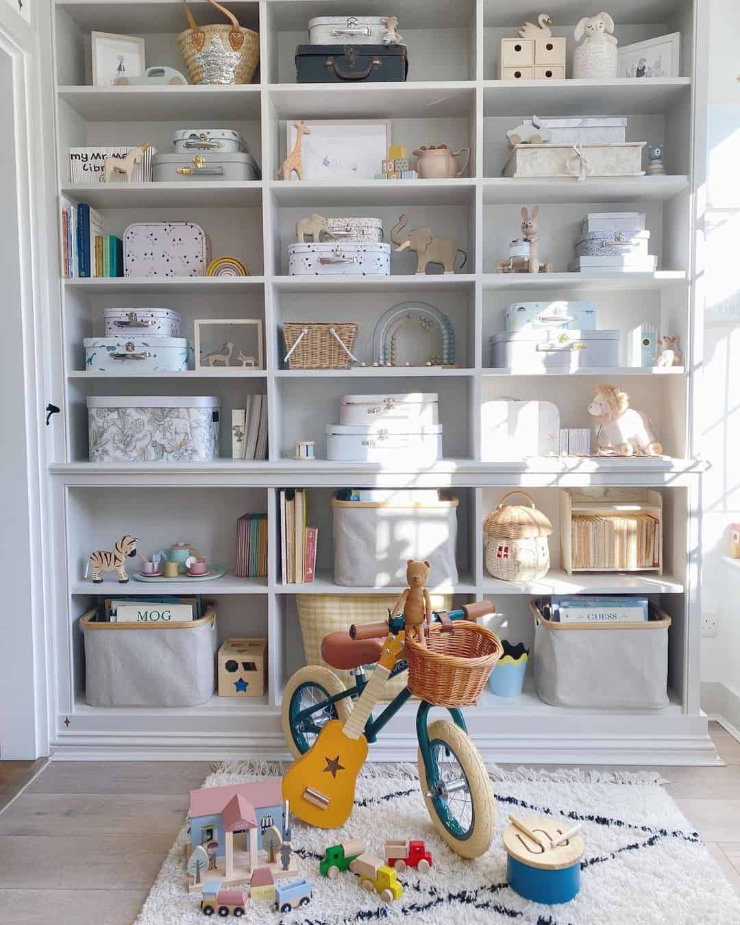 Small Blue Bike in Front of Tall White Shelves