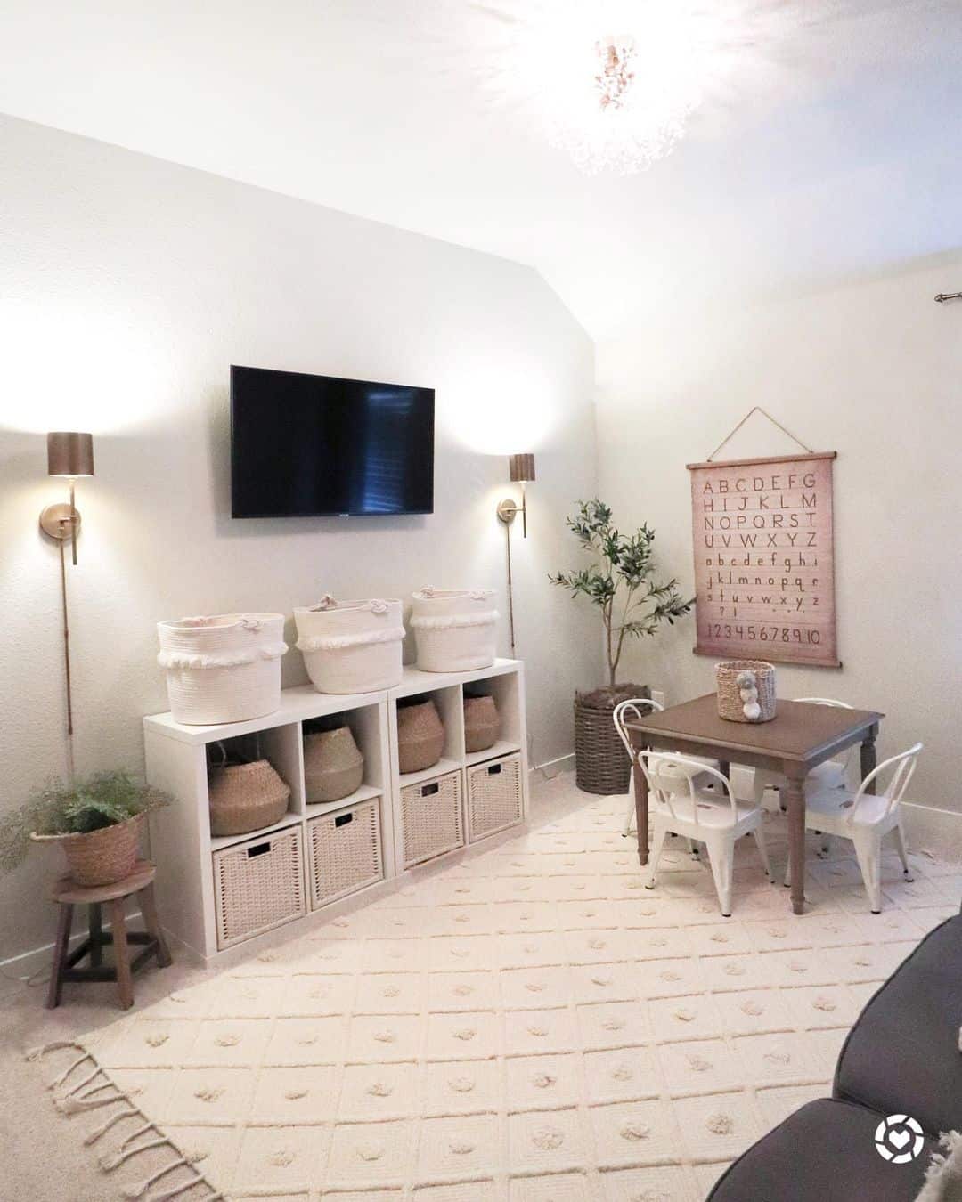 Large White Baskets on White Shelves