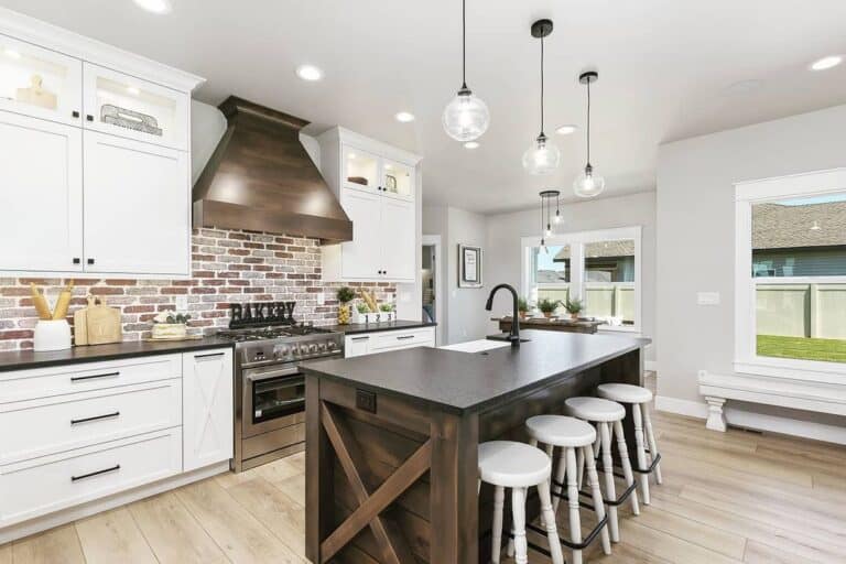 Black Counters and a Red Brick Backsplash